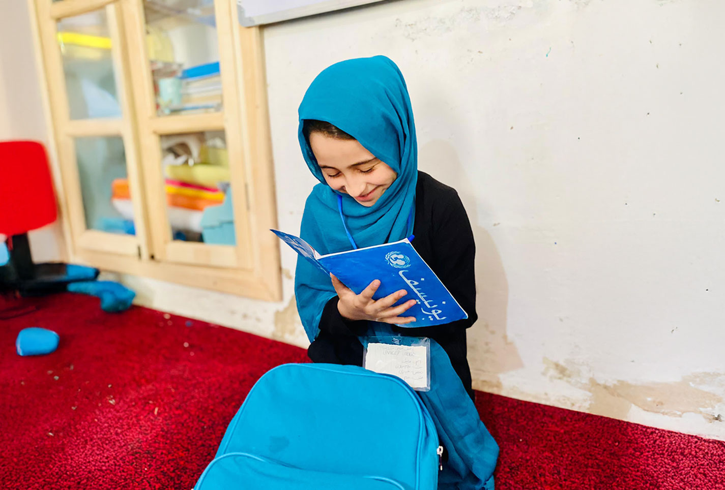 Nazanin Studying her lesson in the class